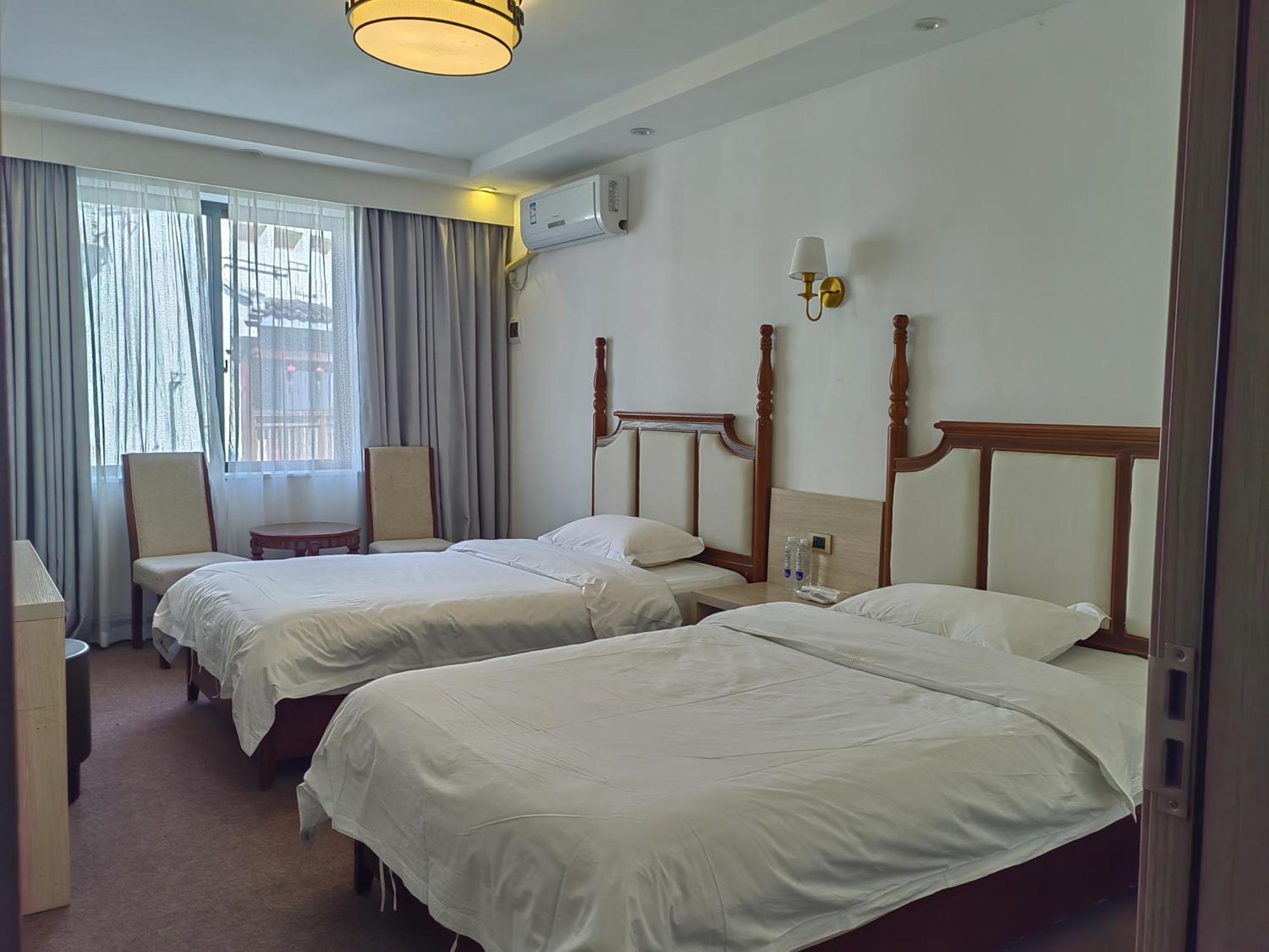 Serene Vale Inn Guilin-Free One Way Pick Up Service To High-Speed Railway Station For 2 Nights Номер фото